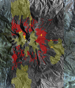 The 3-D Bare Rock Model© classifies satellite data to differentiate rock and formation types. This mineral classification map shows areas containing high concentrations of copper (red) and feldspar (green). Locations of spatial correlation of copper and feldspar are identified (yellow) prospective targets. Image produced by Auracle Remote Sensing.