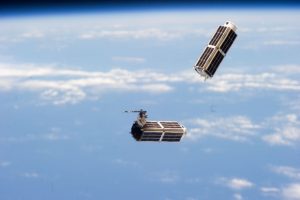 Dove earth observation satellites, built by Planet, launched from the International Space Station. Photograph courtesy of Planet.