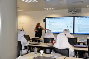 Amal Ezzeddine, Senior Director for Government and Corporate Affairs, lectures at Lockheed Martin's Center for Innovation and Security Solutions in Masdar City, United Arab Emirates. Photograph courtesy of Thuraya.