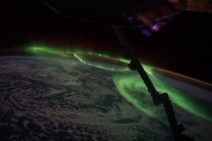 On June 24, 2016, Expedition 48 Commander Jeff Williams of NASA photographed the brilliant lights of an aurora from the International Space Station. Sharing the image on social media, Williams wrote, "We were treated to some spectacular aurora south of Australia today." Image Credit: NASA