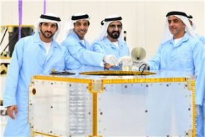 H.H. Sheikh Mohammed bin Rashid Al Maktoum examines KhalifaSat at the Mohammed Bin Rashid Space Centre in Dubai.