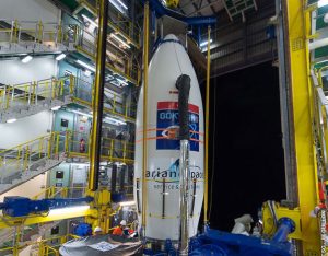 Ahead of its launcher integration, GÖKTÜRK-1 is hoisted to the upper level of the Vega launch site’s mobile gantry ; Credits: Arianespace